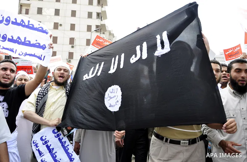Salafists hold banners calling for the release of Kamilia Shehata, a Muslim woman who according to them is kept by the Coptic Church, during a protest in front of Al Nour mosque in Abbasiya, Cairo, Egypt, 29 April 2011....