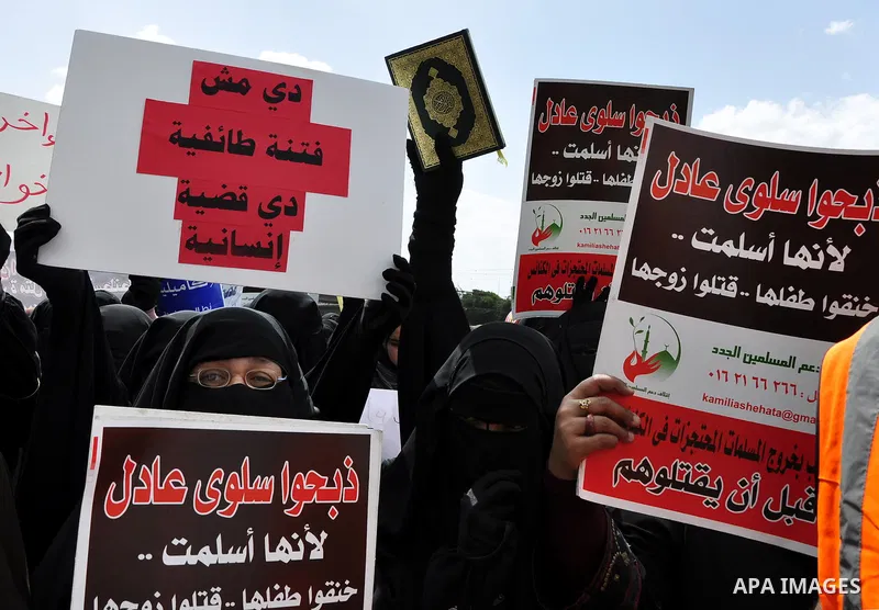 Salafists hold banners calling for the release of Kamilia Shehata, a Muslim woman who according to them is kept by the Coptic Church, during a protest in front of Al Nour mosque in Abbasiya, Cairo, Egypt, 29 April 2011....