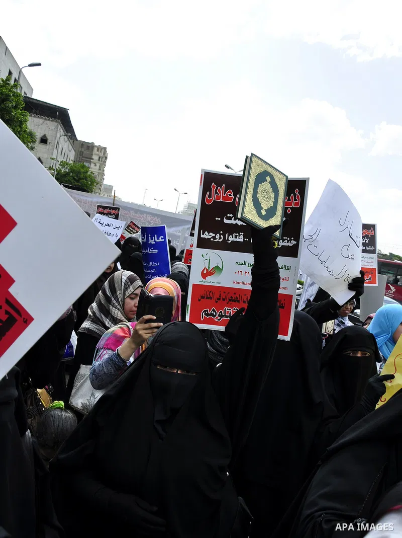 Salafists hold banners calling for the release of Kamilia Shehata, a Muslim woman who according to them is kept by the Coptic Church, during a protest in front of Al Nour mosque in Abbasiya, Cairo, Egypt, 29 April 2011....