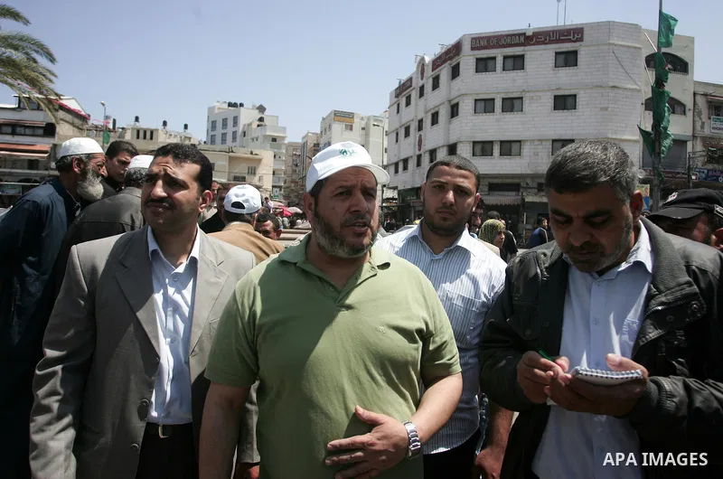 Palestinian Hamas leader, Khaleel Al-Hayia Participate in cleaning streets and planting olive trees during a campaign organized by Hamas in Gaza City on May 1, 2011. Photo by Mohammed Othman