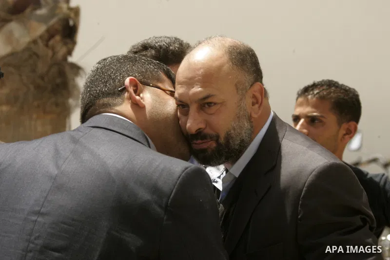 A Gaza Strip-based delegation with members of the Fatah party, the Popular Front for the Liberation of Palestine (PFLP) and the Islamic Jihad wait at the Rafah border terminal in the southern Gaza Strip on May 02, 2011 b...