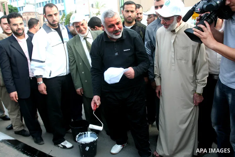 Palestinian prime minister in Gaza Strip, Ismail Haniya paints the side walks during the project entitled "Gaza is the most beautiful despite the blockade" in Gaza city on May 02, 2011. Haniya condemned on Monday the U.S...