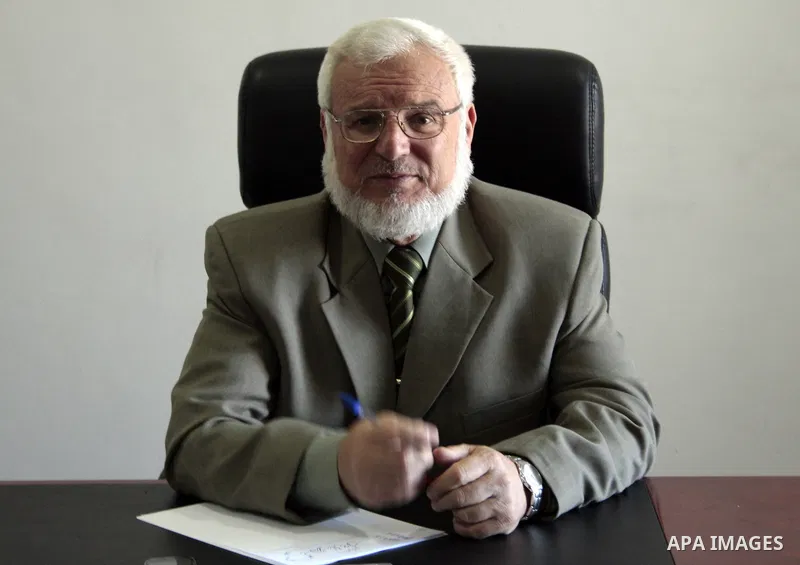 Palestinian parliament spokesman, Aziz Dweik meets with Hamas members of the Palestinian Legislative Council (PLC) at his office in the West Bank city of Hebron on May 03, 2011, a day before Palestinian factions sign a r...