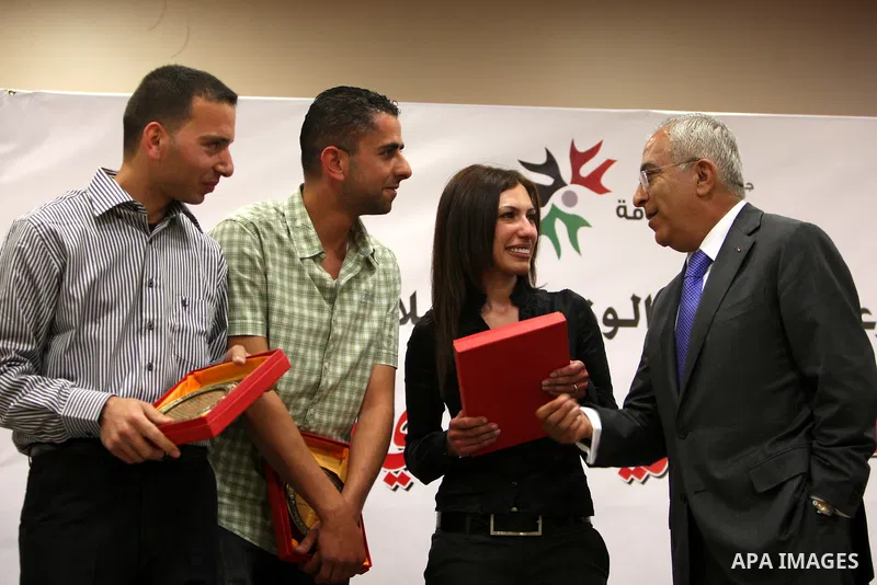 Palestinian Prime Minister, Salam Fayyad distributes press freedom prizes during a ceremony in the West Bank city of Ramallah on May 3, 2011. Photo by Mustafa Abu Dayeh