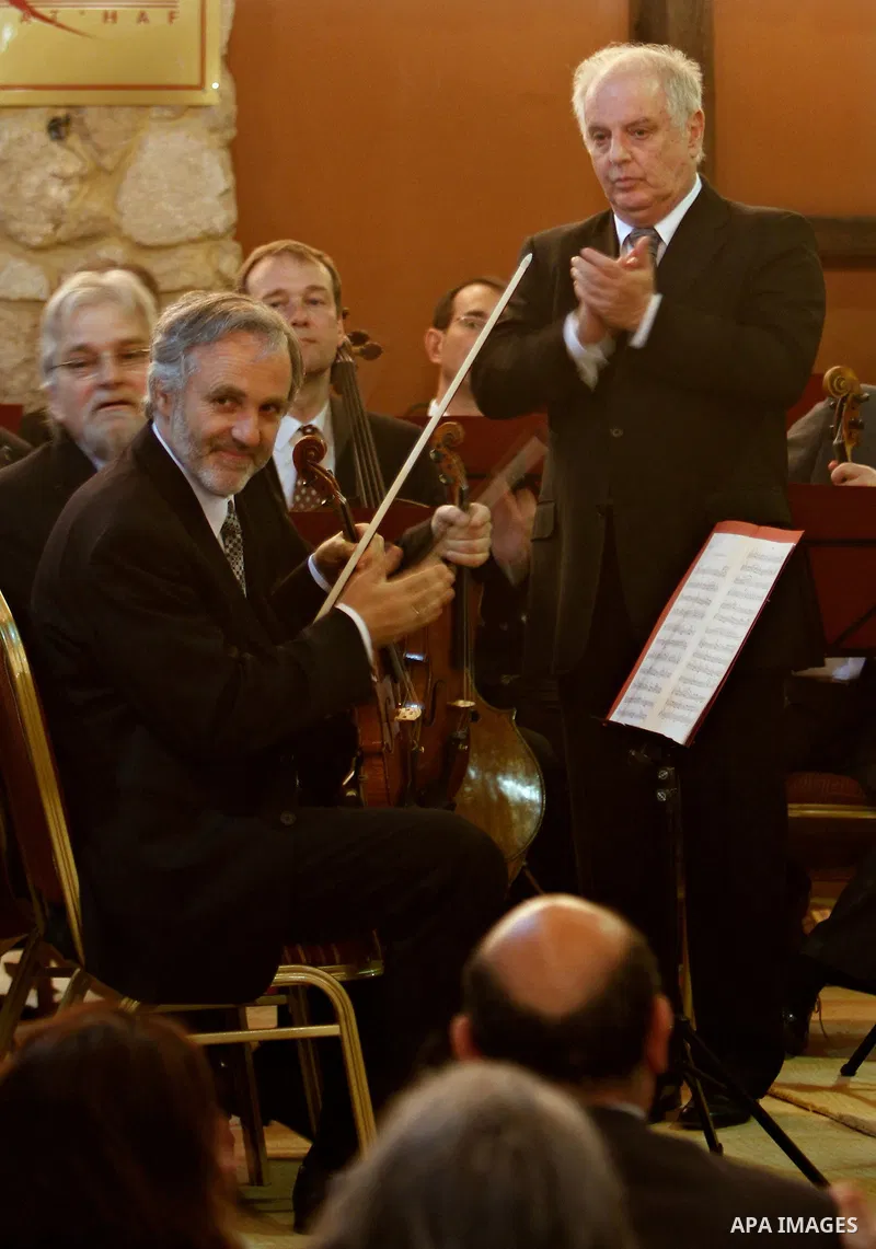 Israeli Maestro Daniel Barenboim, UN Messenger of Peace, conducts the Orchestra for Gaza, a mixed orchestra of European musicians, during concert at the Al Mathaf Cultural House in Gaza City, Tuesday, May, 3, 2011. Baren...