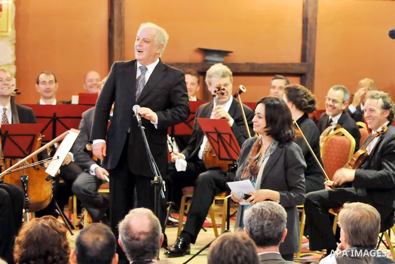 Israeli Maestro Daniel Barenboim, UN Messenger of Peace, conducts the Orchestra for Gaza, a mixed orchestra of European musicians, during concert at the Al Mathaf Cultural House in Gaza City, Tuesday, May, 3, 2011. Baren...