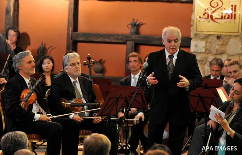 Israeli Maestro Daniel Barenboim, UN Messenger of Peace, conducts the Orchestra for Gaza, a mixed orchestra of European musicians, during concert at the Al Mathaf Cultural House in Gaza City, Tuesday, May, 3, 2011. Baren...