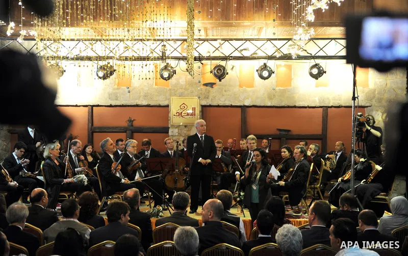 Israeli Maestro Daniel Barenboim, UN Messenger of Peace, conducts the Orchestra for Gaza, a mixed orchestra of European musicians, during concert at the Al Mathaf Cultural House in Gaza City, Tuesday, May, 3, 2011. Baren...