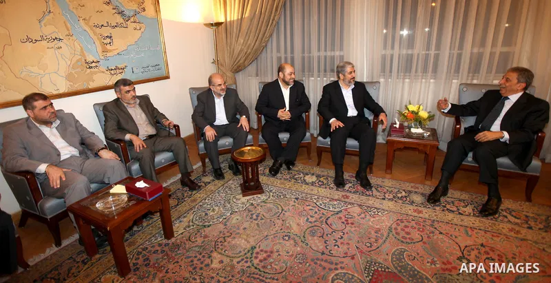 Arab League General Secretary Amr Mussa meets with Senior Hamas Leader Khaled Mashaal and senior Hamas members in Cairo on May 3, 2011. Palestinian factions signed a reconciliation deal in Cairo to end the divide between...