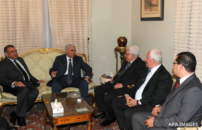 Palestinian President Mahmoud Abbas meets with the Egyptian intelligence chief in Cairo on May 3, 2011. Palestinian factions signed a reconciliation deal in Cairo to end the divide between the West Bank and Gaza and hold...