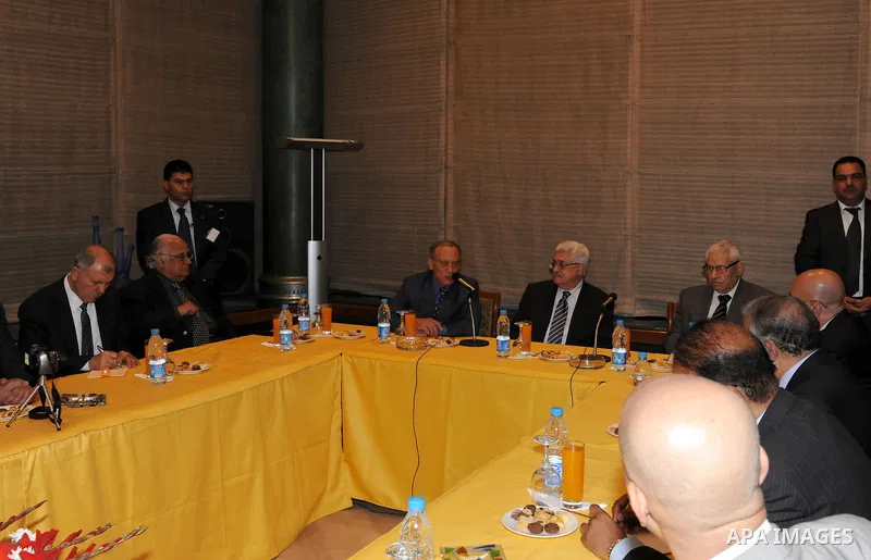 Palestinian President Mahmoud Abbas attends an interview in the Egyptian Al-Ahram newspaper in Cairo on May 3, 2011. Palestinian factions signed a reconciliation deal in Cairo to end the divide between the West Bank and...
