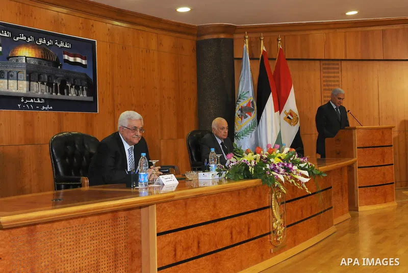 Palestinian President Mahmoud Abbas (Abu Mazen) attends the signing of reconciliation agreement in Cairo, Egypt on May 4,2011. Fatah and Hamas officials lead a ceremony celebrating the signing of a reconciliation deal in...
