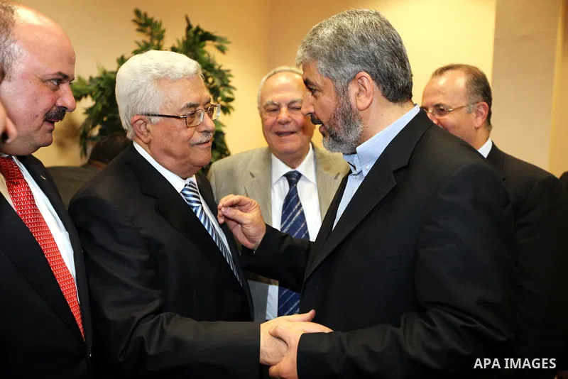 Senior Hamas leader Khaled Mashaal attends the signing of reconciliation agreement in Cairo, Egypt on May 4,2011. Fatah and Hamas officials lead a ceremony celebrating the signing of a reconciliation deal intended to rep...