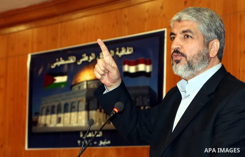 Senior Hamas leader Khaled Mashaal attends the signing of reconciliation agreement in Cairo, Egypt on May 4,2011. Fatah and Hamas officials lead a ceremony celebrating the signing of a reconciliation deal intended to rep...