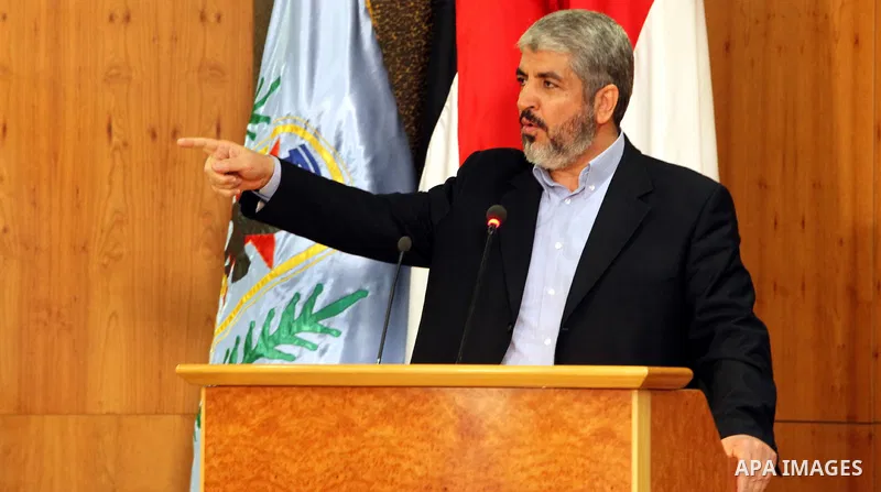 Senior Hamas leader Khaled Mashaal attends the signing of reconciliation agreement in Cairo, Egypt on May 4,2011. Fatah and Hamas officials lead a ceremony celebrating the signing of a reconciliation deal intended to rep...