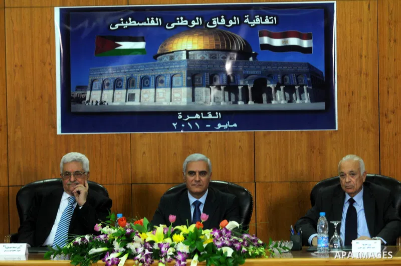 Palestinian President Mahmoud Abbas (Abu Mazen) attends the signing of reconciliation agreement in Cairo, Egypt on May 4,2011. Fatah and Hamas officials lead a ceremony celebrating the signing of a reconciliation deal in...