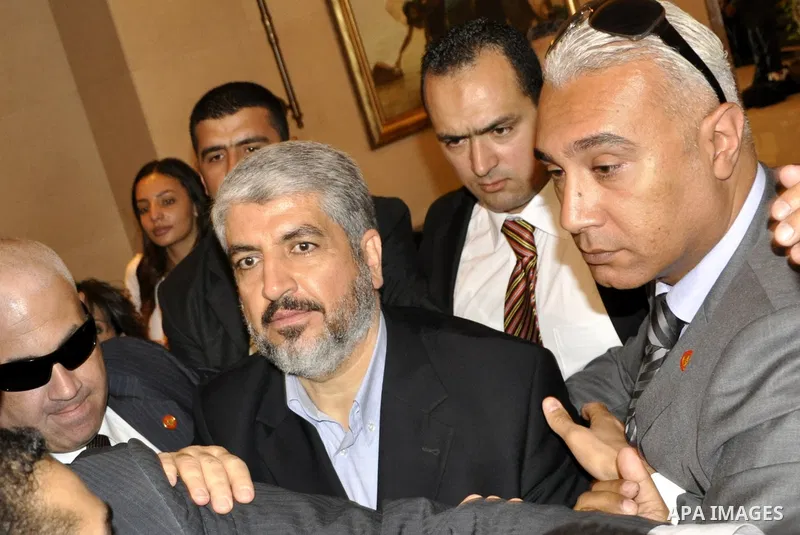Senior Hamas leader, Khaled Mashaal leaves a hotel in Cairo, Egypt on May 4,2011. Fatah and Hamas officials lead a ceremony celebrating the signing of a reconciliation deal intended to repair ties between the rival movem...
