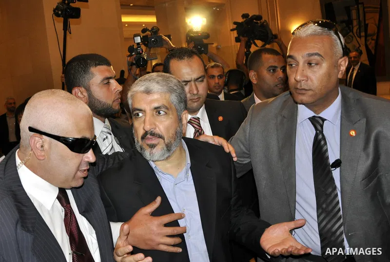 Senior Hamas leader, Khaled Mashaal leaves a hotel in Cairo, Egypt on May 4,2011. Fatah and Hamas officials lead a ceremony celebrating the signing of a reconciliation deal intended to repair ties between the rival movem...