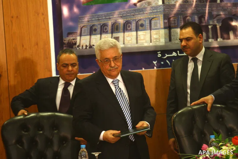 Palestinian President Mahmoud Abbas (Abu Mazen) attends the signing of reconciliation agreement in Cairo, Egypt on May 4,2011. Fatah and Hamas officials lead a ceremony celebrating the signing of a reconciliation deal in...