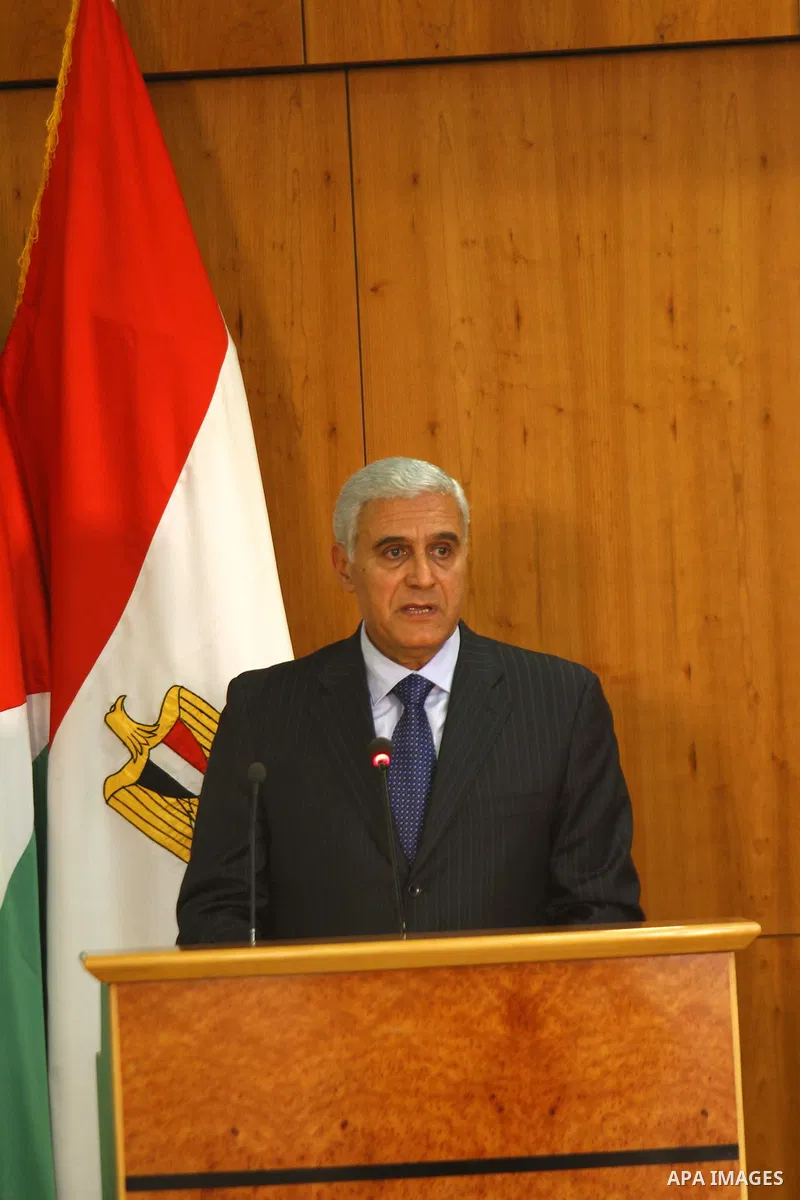 Egyptian intelligence chief General Murad Muafi delivers a speech at a reconciliation ceremony between the Palestinian Fatah party and the Hamas movement in the Egyptian capital Cairo on May 4, 2011. Fatah and Hamas offi...