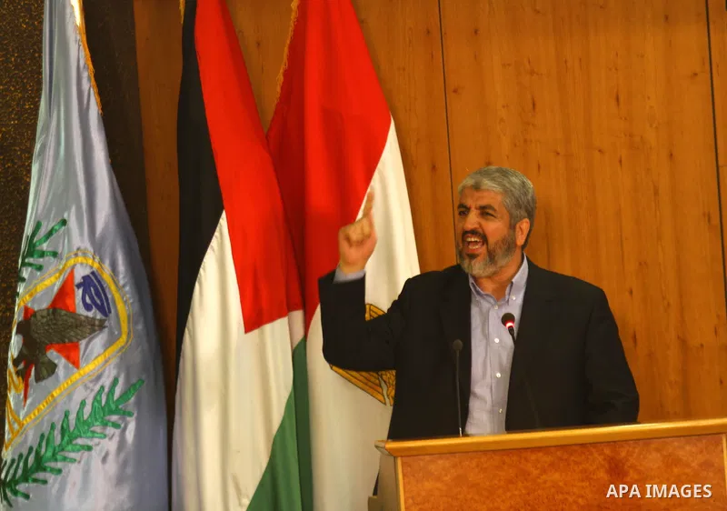 Senior Hamas leader Khaled Mashaal delivers speech during the signing of reconciliation agreement in Cairo, Egypt on May 4,2011. Fatah and Hamas officials lead a ceremony celebrating the signing of a reconciliation deal...
