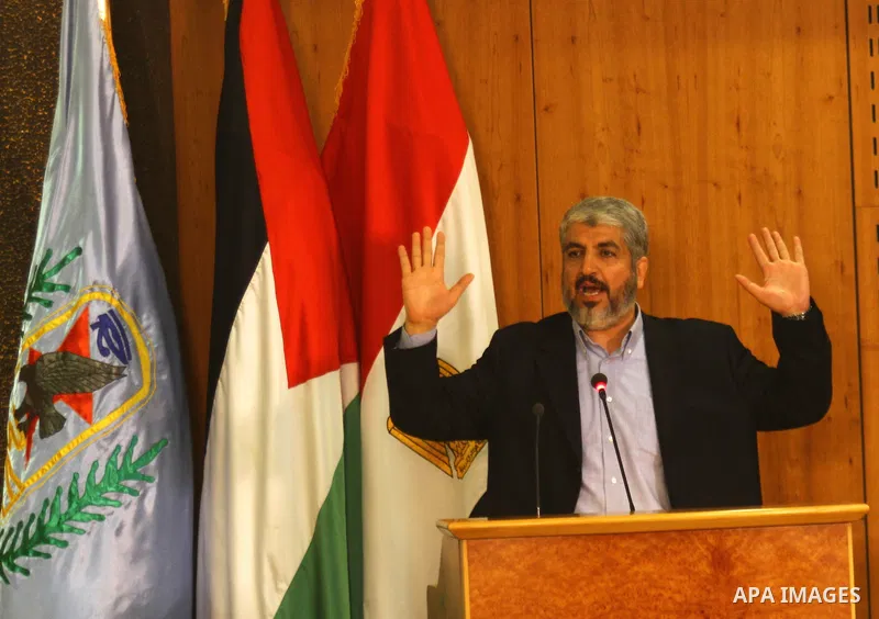 Senior Hamas leader Khaled Mashaal delivers speech during the signing of reconciliation agreement in Cairo, Egypt on May 4,2011. Fatah and Hamas officials lead a ceremony celebrating the signing of a reconciliation deal...