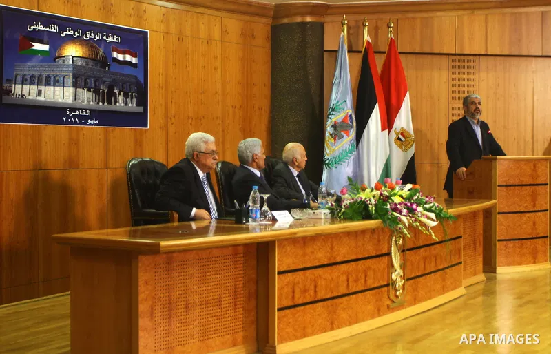 Senior Hamas leader Khaled Mashaal delivers speech during the signing of reconciliation agreement in Cairo, Egypt on May 4,2011. Fatah and Hamas officials lead a ceremony celebrating the signing of a reconciliation deal...
