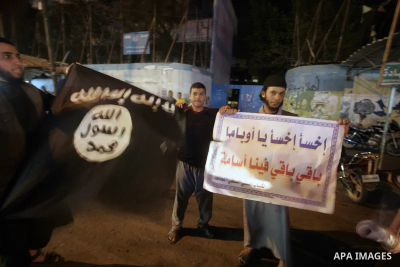 Palestinian Salafi group holds a picture of Osama bin Laden, during a protest in Rafah, southern Gaza Strip, Friday, May 6, 2011. Al-Qaida on Friday confirmed the killing of Osama bin Laden and warned of retaliation, say...