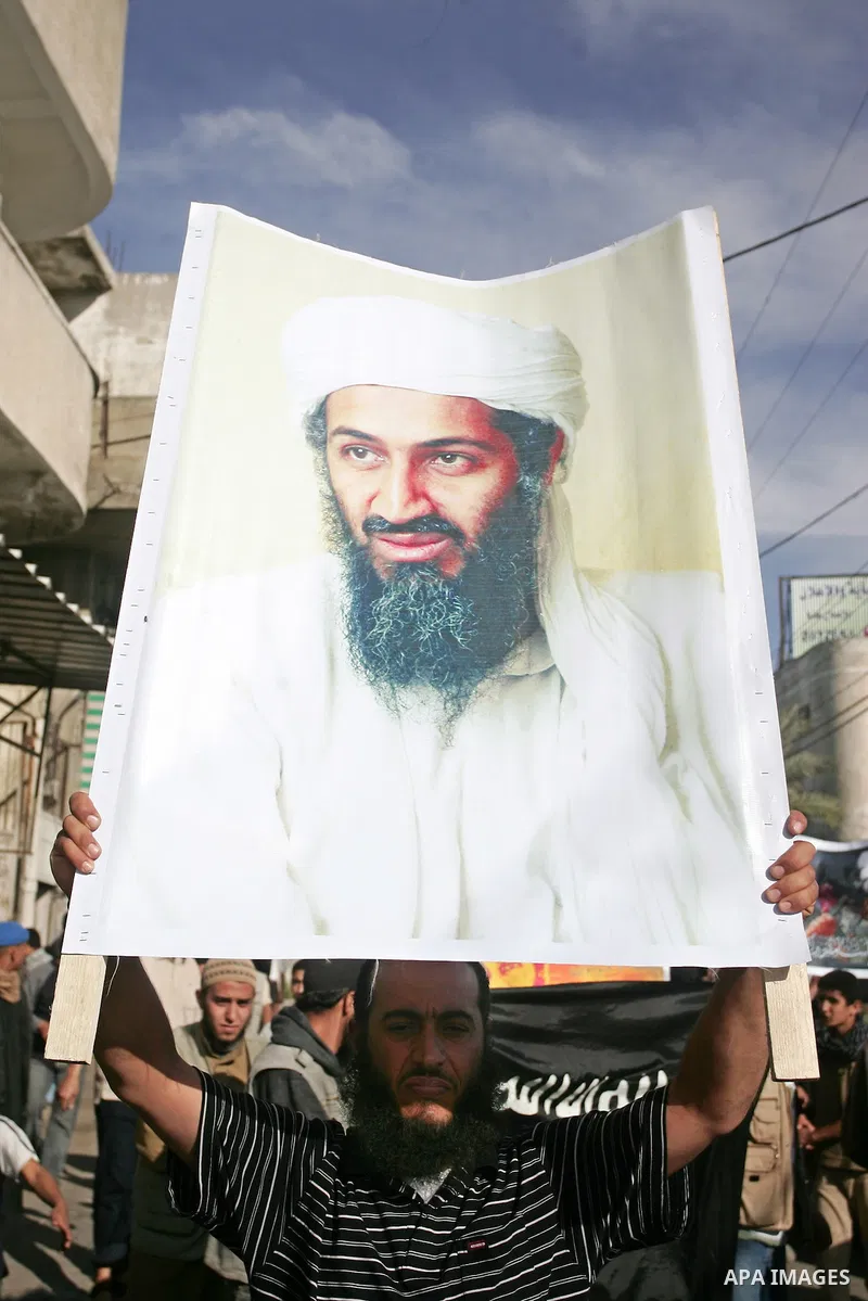 Palestinian Salafist groups, carrying pictures of late Al-Qaeda chief Osama bin Laden, march at Gaza central square, in Gaza city on May 7, 2011, during a demonstration to denounce the killing of bin Laden by US forces i...