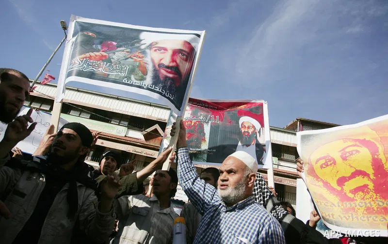 Palestinian Salafist groups, carrying pictures of late Al-Qaeda chief Osama bin Laden, march at Gaza central square, in Gaza city on May 7, 2011, during a demonstration to denounce the killing of bin Laden by US forces i...