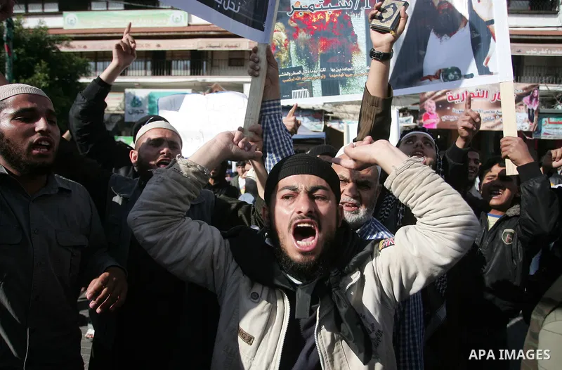 Palestinian Salafist groups, carrying pictures of late Al-Qaeda chief Osama bin Laden, march at Gaza central square, in Gaza city on May 7, 2011, during a demonstration to denounce the killing of bin Laden by US forces i...