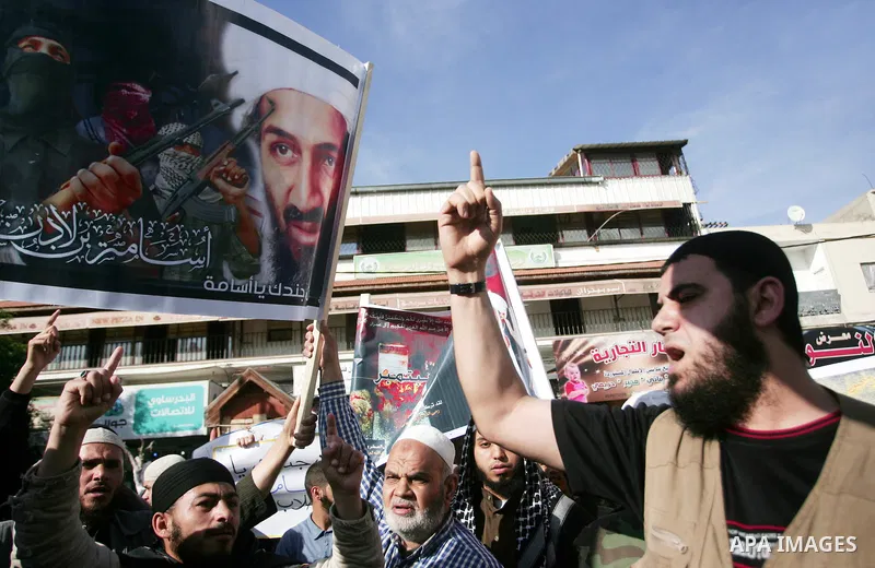 Palestinian Salafist groups, carrying pictures of late Al-Qaeda chief Osama bin Laden, march at Gaza central square, in Gaza city on May 7, 2011, during a demonstration to denounce the killing of bin Laden by US forces i...