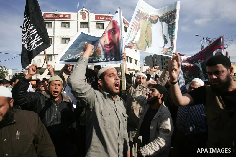 Palestinian Salafist groups, carrying pictures of late Al-Qaeda chief Osama bin Laden, march at Gaza central square, in Gaza city on May 7, 2011, during a demonstration to denounce the killing of bin Laden by US forces i...