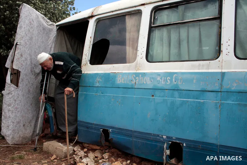 A Palestinian Sheikh Abed el-Haseeb Zaloum, 78 years, lives in a damaged bus, since his house was demolished before ten years by Israeli bulldozers near the Jewish settlement of Karyat Arbaa, in the West Bank city of Heb...