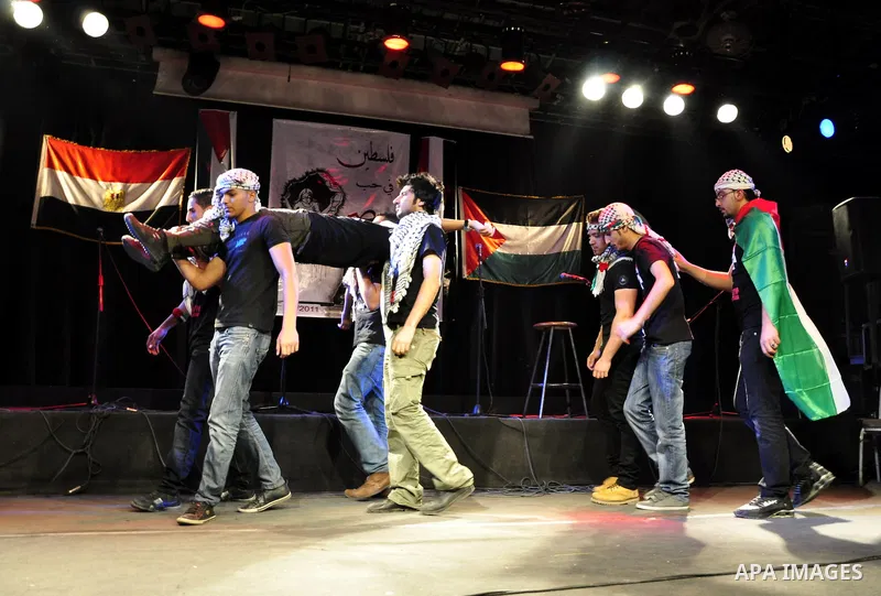 Egyptians and Palestinians gather in celebration To support the third intifada in El- Sawi Hall in Cairo, on May 7, 2011. Photo by Ahmed Asad