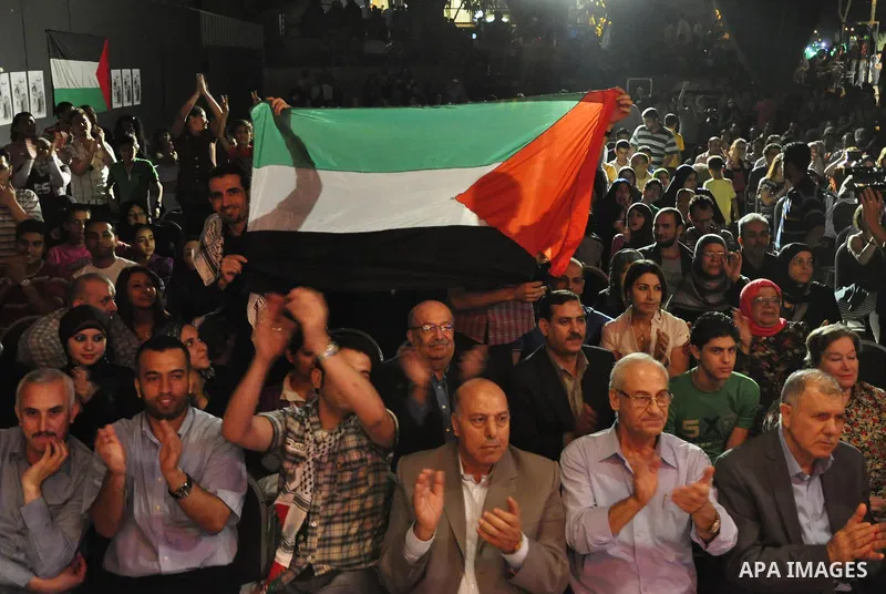 Egyptians and Palestinians gather in celebration To support the third intifada in El- Sawi Hall in Cairo, on May 7, 2011. Photo by Ahmed Asad
