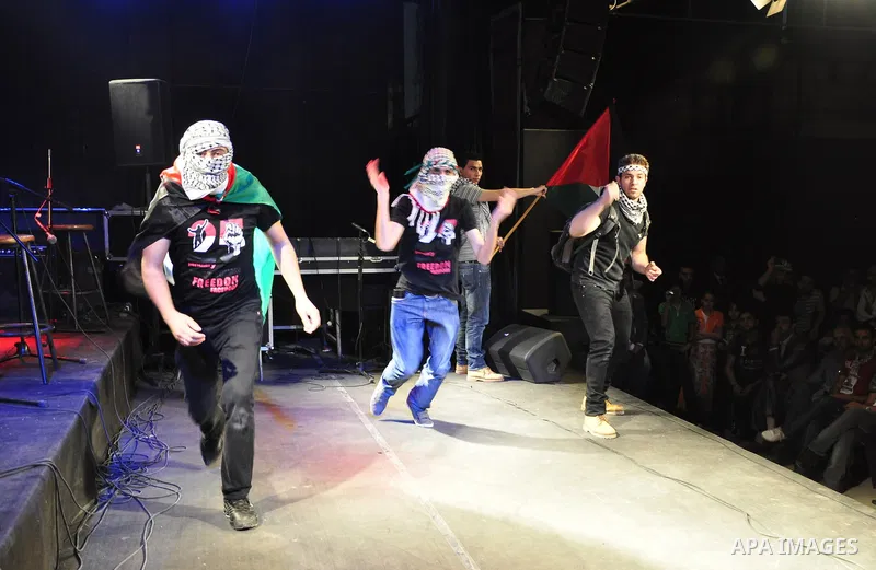 Egyptians and Palestinians gather in celebration To support the third intifada in El- Sawi Hall in Cairo, on May 7, 2011. Photo by Ahmed Asad