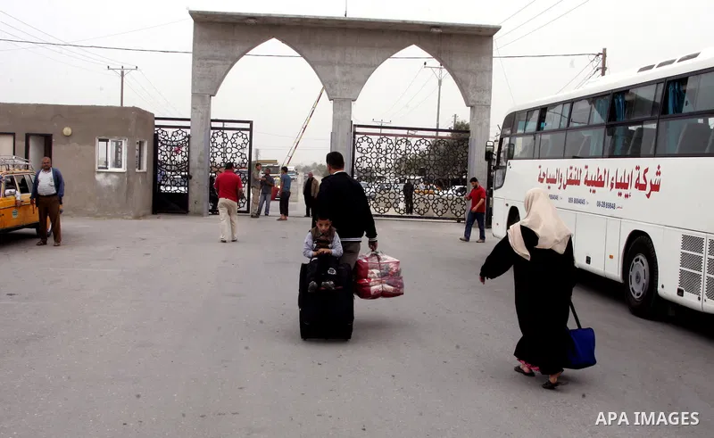 Palestinians arrive at their side of the Rafah border crossing with Egypt in the southern Gaza Strip on May 8, 2011. photo by Abed Rahim Khatib