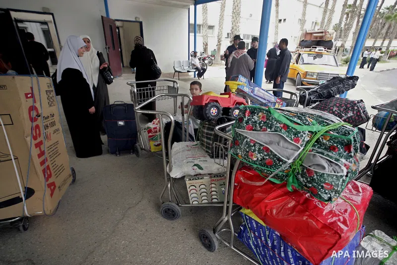 Palestinians arrive at their side of the Rafah border crossing with Egypt in the southern Gaza Strip on May 8, 2011. photo by Abed Rahim Khatib