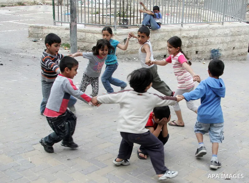 Palestinians children play in the street in the East Jerusalem neighborhood of Silwan, on May 08, 2011. Photo by Mahfouz Abu Turk
