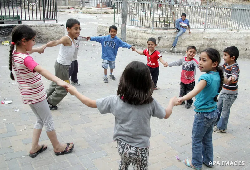 Palestinians children play in the street in the East Jerusalem neighborhood of Silwan, on May 08, 2011. Photo by Mahfouz Abu Turk