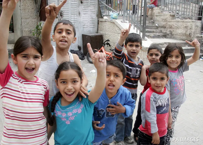 Palestinians children play in the street in the East Jerusalem neighborhood of Silwan, on May 08, 2011. Photo by Mahfouz Abu Turk