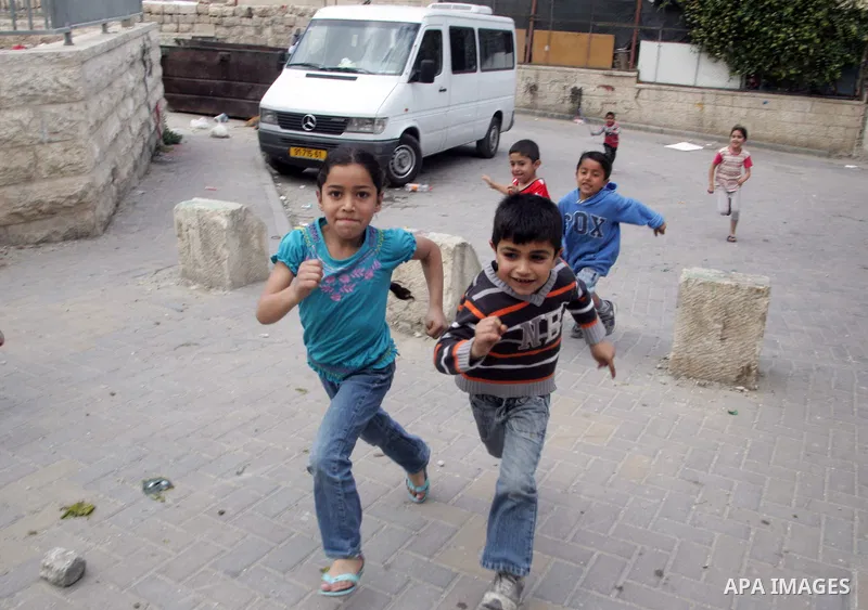 Palestinians children play in the street in the East Jerusalem neighborhood of Silwan, on May 08, 2011. Photo by Mahfouz Abu Turk