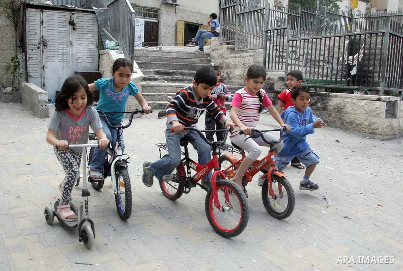 Palestinians children play in the street in the East Jerusalem neighborhood of Silwan, on May 08, 2011. Photo by Mahfouz Abu Turk