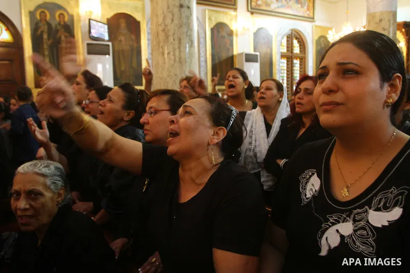 Egyptian Coptic Christian women mourn during the funeral of a victim of sectarian clashes in Cairo on May 8, 2011 as Egypt's military rulers warned they will use an "iron hand" to protect national security after clashes...