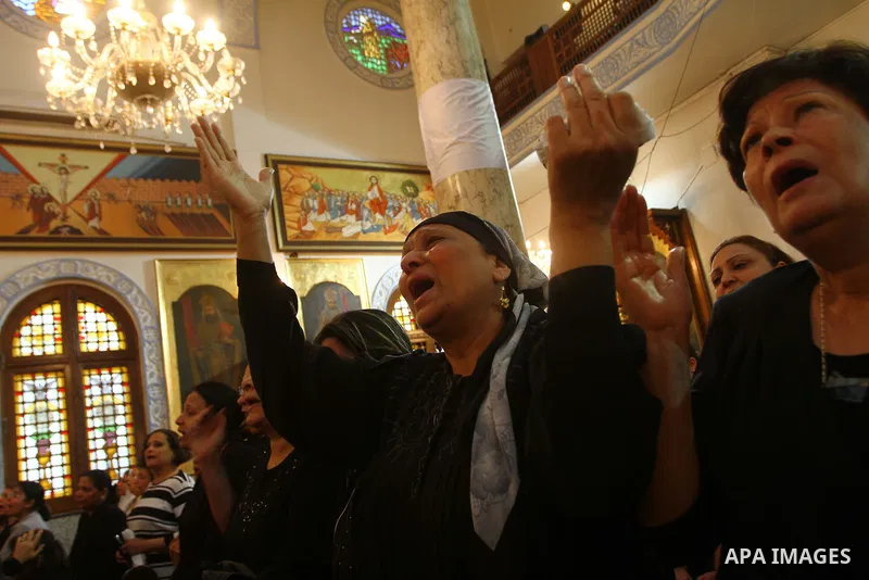 Egyptian Coptic Christian women mourn during the funeral of a victim of sectarian clashes in Cairo on May 8, 2011 as Egypt's military rulers warned they will use an "iron hand" to protect national security after clashes...