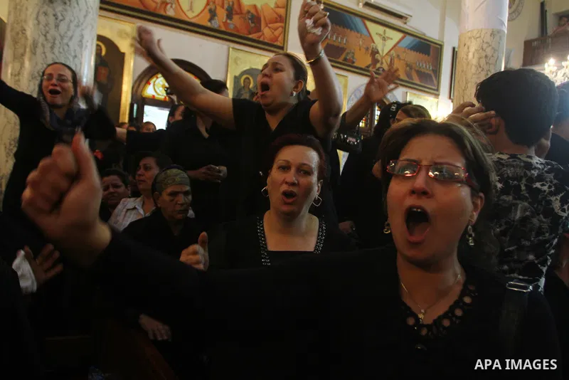 Egyptian Coptic Christian women mourn during the funeral of a victim of sectarian clashes in Cairo on May 8, 2011 as Egypt's military rulers warned they will use an "iron hand" to protect national security after clashes...