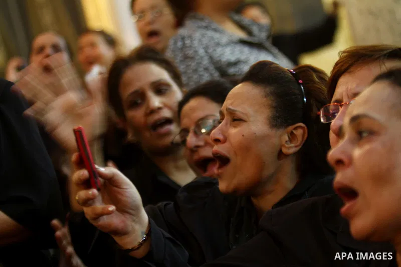 Egyptian Coptic Christian women mourn during the funeral of a victim of sectarian clashes in Cairo on May 8, 2011 as Egypt's military rulers warned they will use an "iron hand" to protect national security after clashes...