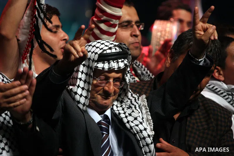 Palestinian revolution poet Ibrahim Abu Saleh ''Abu Arab" participates in a celebration in the West Bank city of Ramallah, Sunday, May 8, 2011 to commemorate the 63rd anniversary of Nakba, or catastrophe, the Arabic term...