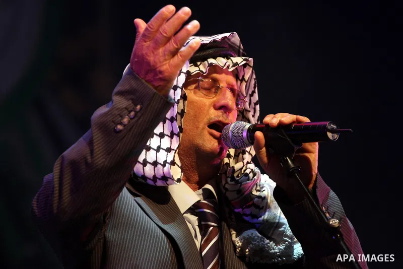 Palestinian revolution poet Ibrahim Abu Saleh ''Abu Arab" participates in a celebration in the West Bank city of Ramallah, Sunday, May 8, 2011 to commemorate the 63rd anniversary of Nakba, or catastrophe, the Arabic term...